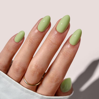 Sporty emerald green almond nail designs
