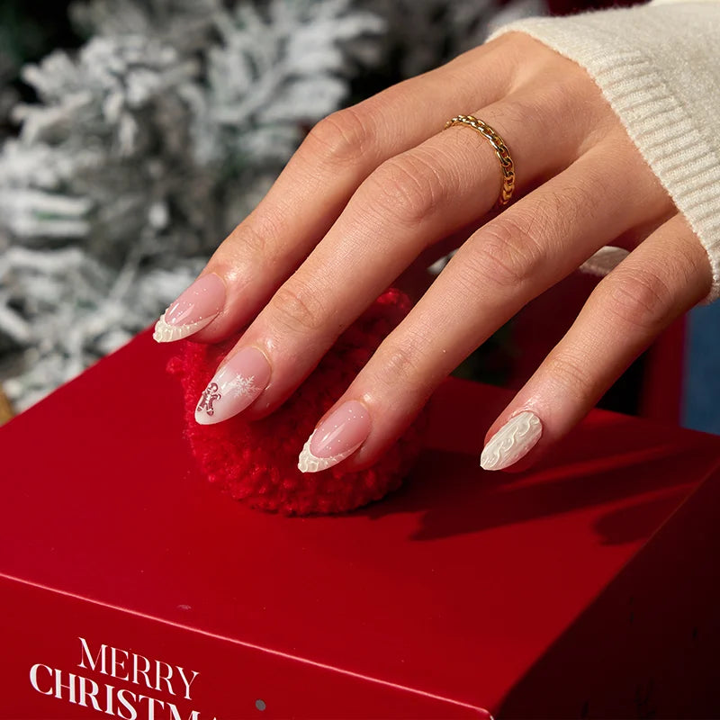 Gingerbread inspired warm brown nails with white icing details