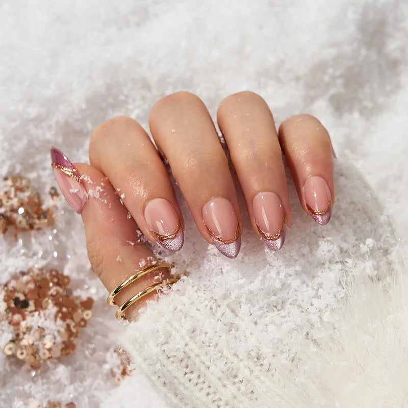 Pink Aurora almond press-on nails with an iridescent pink glow