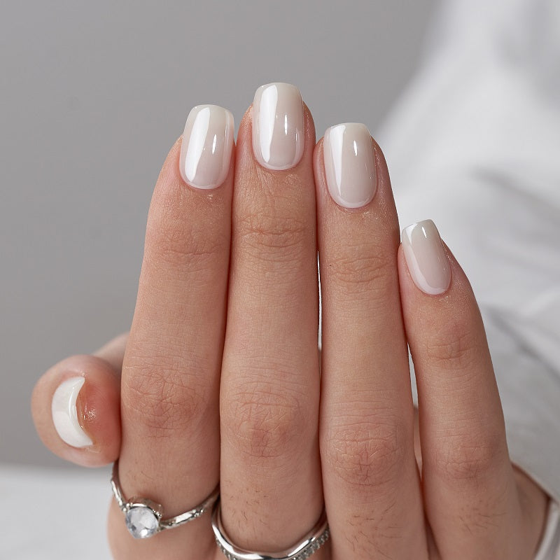 Milky white pearlescent chrome snow nails