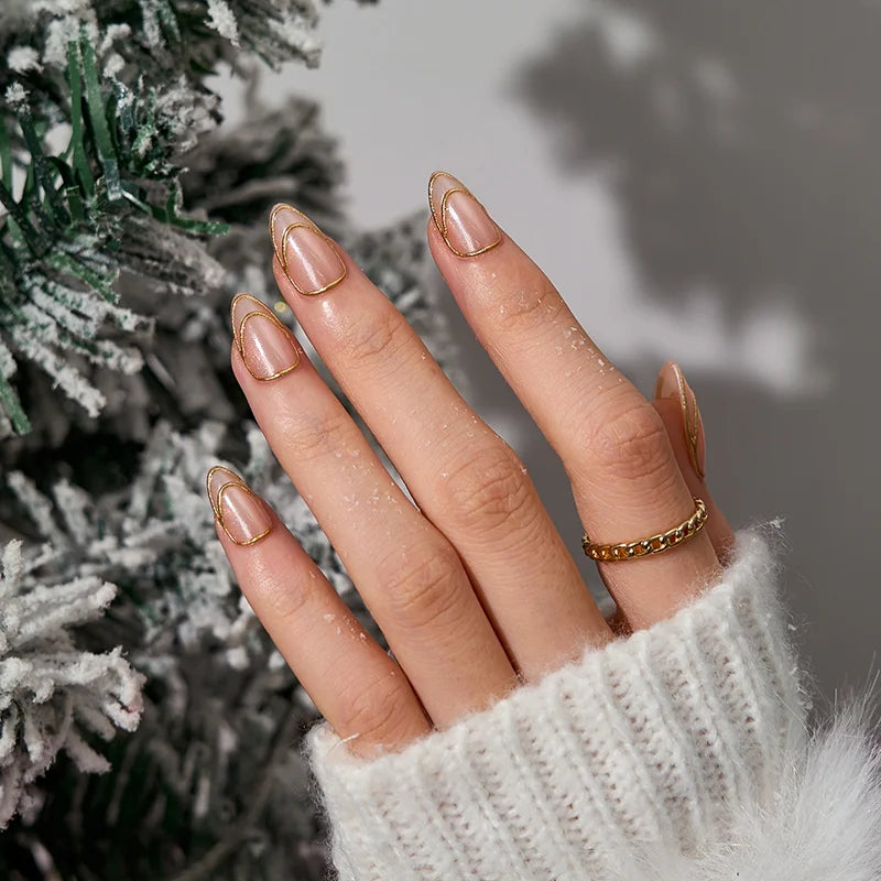 Double Gold almond press-on nails with metallic gold accents
